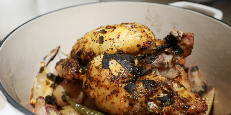 whole roasted chicken with potatoes and vegetables